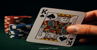 AT77